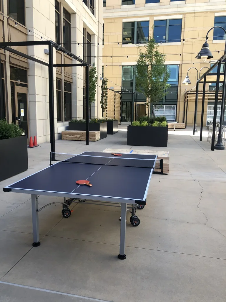 Hidden Gem rooftop amenity in use, the finished office patio