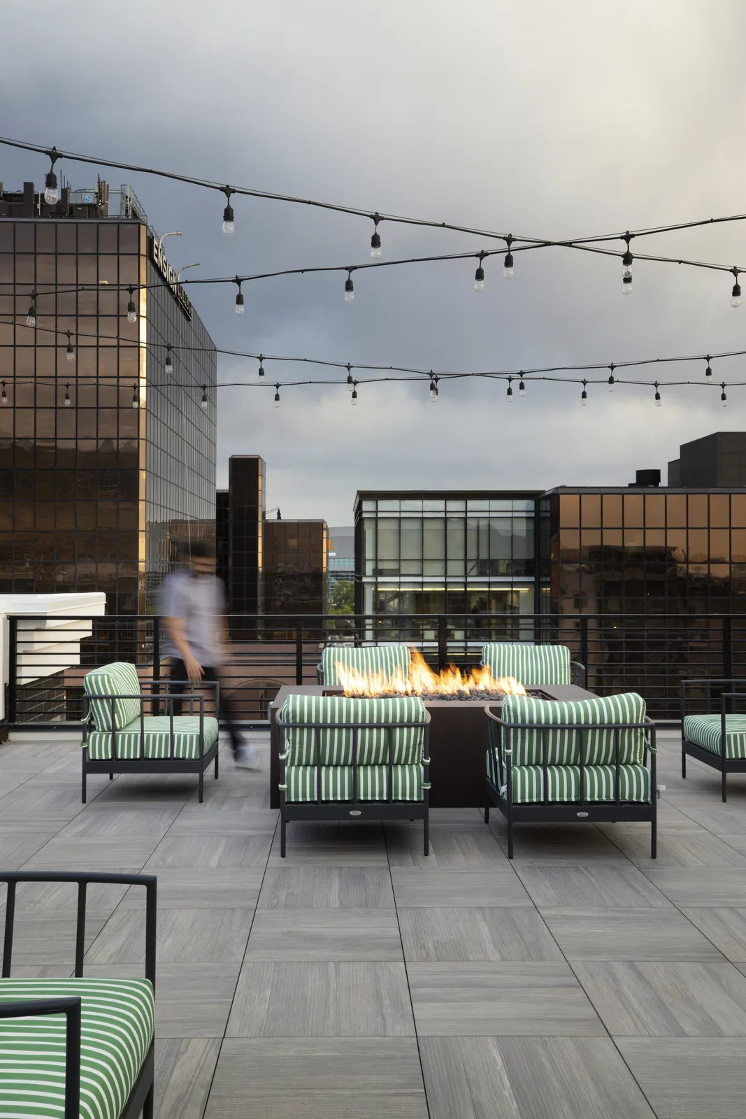 The rooftop · 360-degree views, fire pits, outdoor kitchens