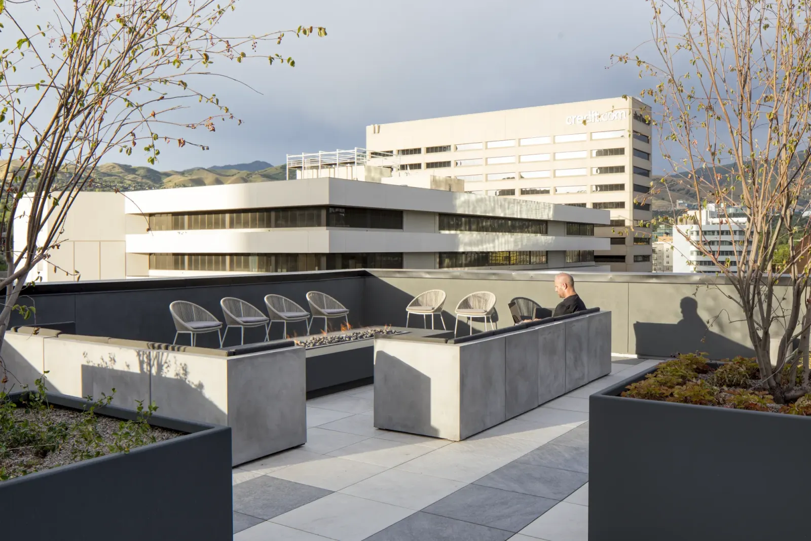 STAND-IN BRANDON TO VET — The Randi wide rooftop context (TIFF master)